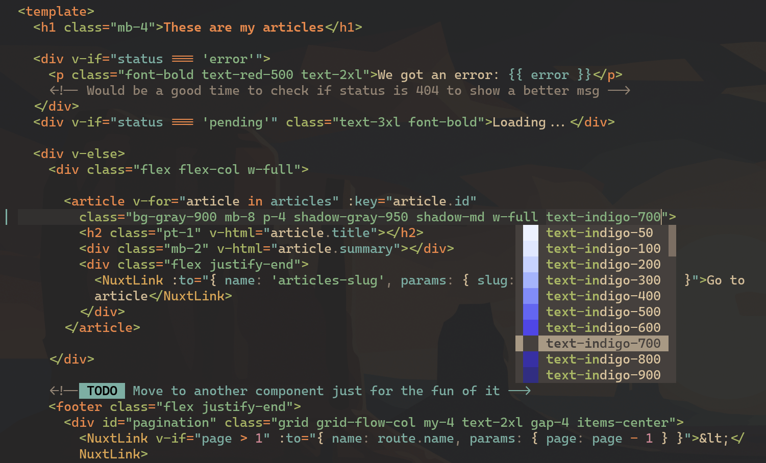 Un tag template édité dans Neovim avec le menu de suggestions qui montre un apreçu de toutes les couleurs indigo- de Tailwind depuis l'attribut 'class' d'un élément
