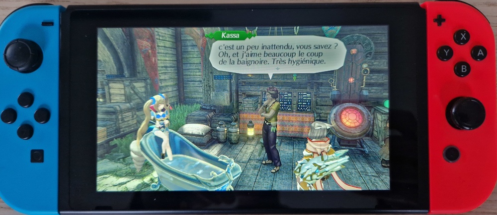 Photo de la Switch avec la fille qui est tout le temps dans une baignoire sur l'écran